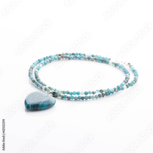 Obraz na płótnie Gemstone beaded necklace with heart pendant. Energy crystals, healing stone jewelry. Handmade accessories. Birthstones. w salonie