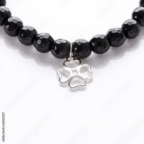 Obraz na płótnie Gemstone beaded bracelets. Healing natural stones. Handmade jewelry with silver pendant. w salonie
