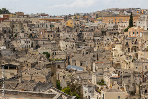 View of the city of Matera by day. Typical Salento illuminations during the holidays. Feast of the Brown Madonna, Matera. Prehistoric caves from the Murgia.Mysterious and ancient land among the stones © Mattia