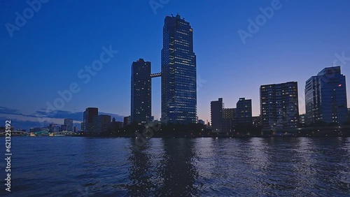 Night light Tokyo, Tsukuda, Toyosu skyscrapers and bridge the Sumida River Yakatabune, pleasure boat