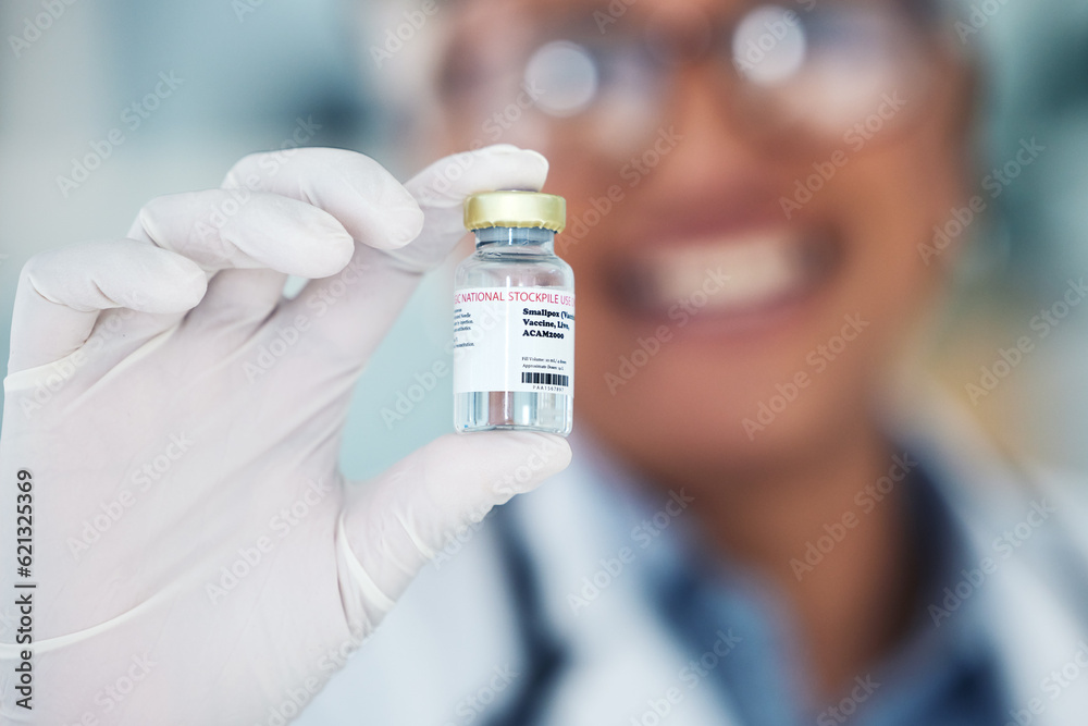 Healthcare, hands and vaccine and medicine bottle with doctor in blurry background. Innovation, vaccination and medical professional with container for treatment for prevention or cure for smallpox. Healthcare, hands and vaccine and medicine bottle with doctor in blurry background. Innovation, vaccination and medical professional with container for treatment for prevention or cure for smallpox.