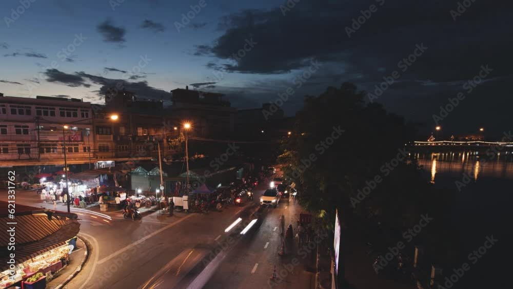 Night time traffic street at junction with cars light, top view 4k timelapse. Cars driving at high speed. Zoom in. Night time traffic street at junction with cars light, top view 4k timelapse. Cars driving at high speed. Zoom in.