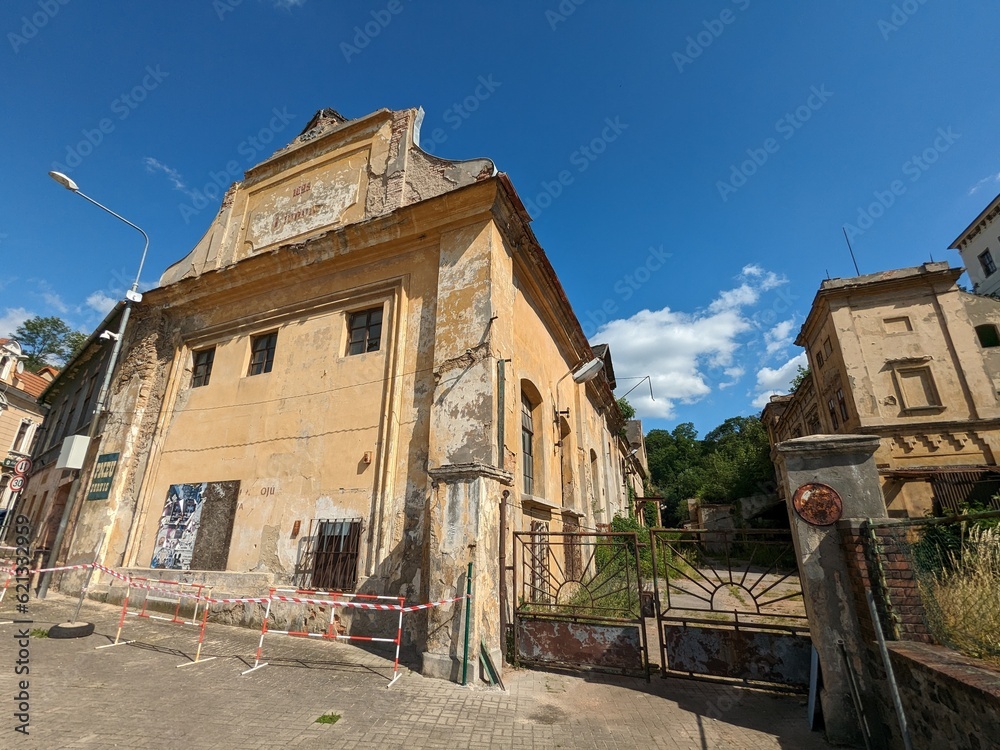 Obraz premium Bilina historical city center with fountains and cobble stone square, churches and castle above the old town