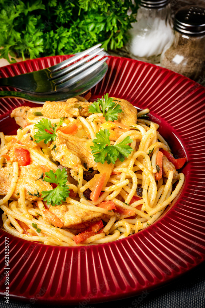Fried noodles with chicken and vegetables. Fried noodles with chicken and vegetables.