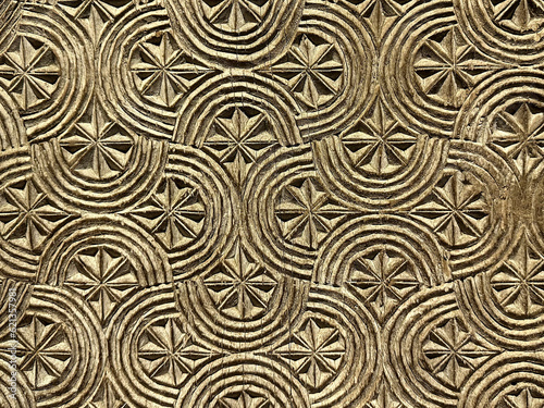 Fényképezés Fine wood carving textured background, fragment of ancient handmade door, orient