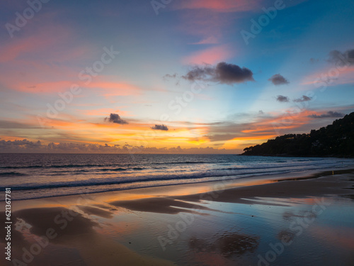 Drones take pictures of the beautiful sky by the beach in stunning sunset..colorful sky in sunset above Karon city at sunset. .Scene of romantic sky sunset background..