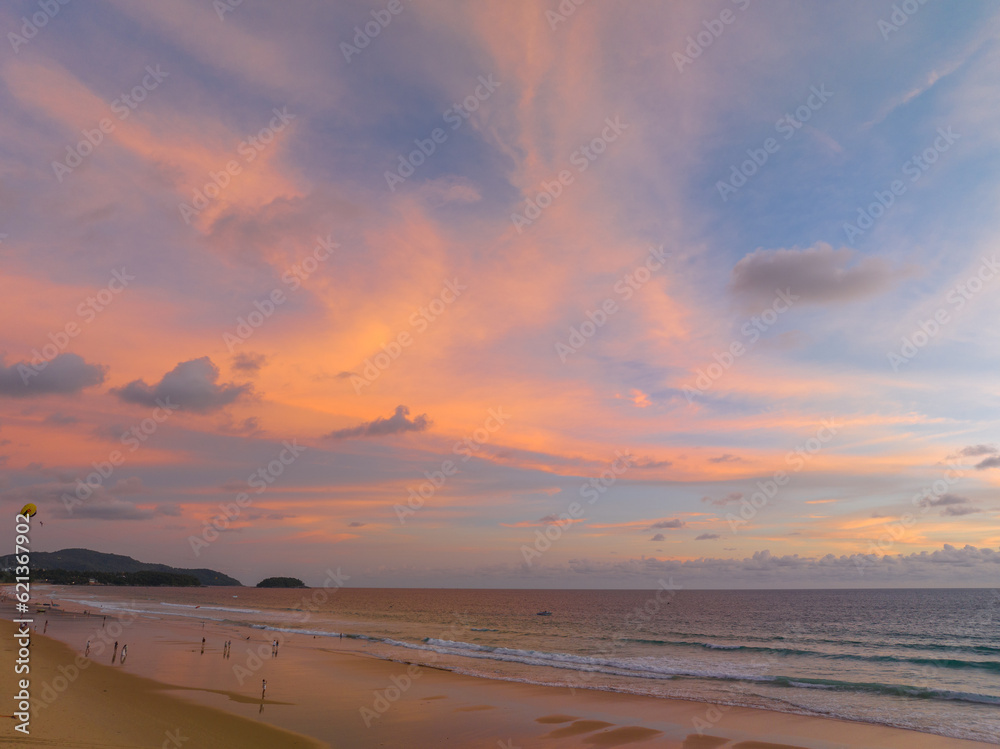 Aerial panorama view scene romantic pink sky on sunset at Karon beach. .abstract nature background..Sunset with bright pink light rays and other atmospheric effects. .abstract nature background.
