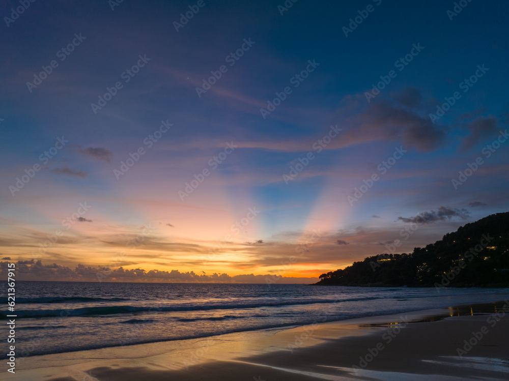 Aerial panorama view scene romantic pink sky on sunset at Karon beach. .abstract nature background..Sunset with bright pink light rays and other atmospheric effects. .abstract nature background. Aerial panorama view scene romantic pink sky on sunset at Karon beach. .abstract nature background..Sunset with bright pink light rays and other atmospheric effects. .abstract nature background.