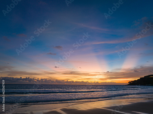 Aerial panorama view scene romantic pink sky on sunset at Karon beach. .abstract nature background..Sunset with bright pink light rays and other atmospheric effects. .abstract nature background. © Narong Niemhom