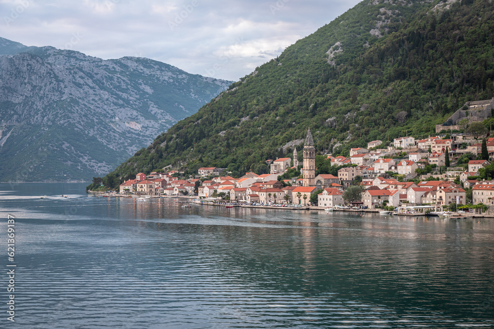 Landscape Exposure done from a cruise ship at sunset, showing the sea entrance to Kotor bay and its beautiful coastal landscapes and small villages.