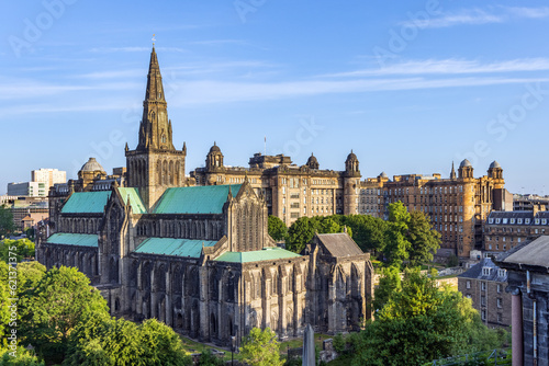 Glasgow Cathedral, the oldest cathedral on mainland Scotland, and the Old Royal Infirmary shot from the Necropolis Victorian Cemetery photo