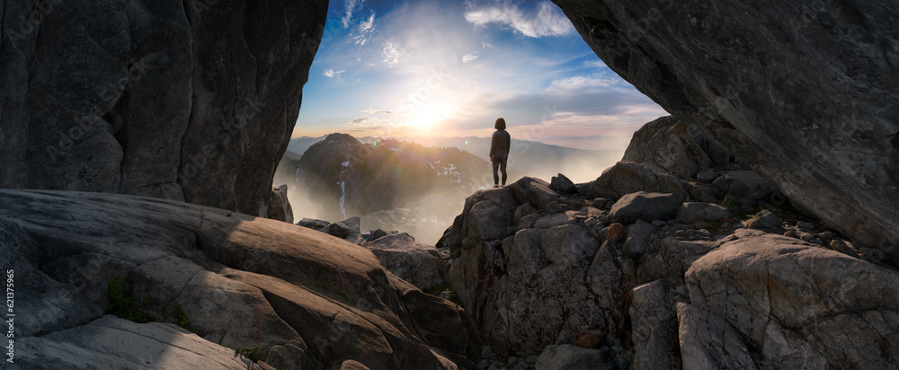 Adventurous Woman Standing in cave on top of Mountain. Extreme Adventure Composite