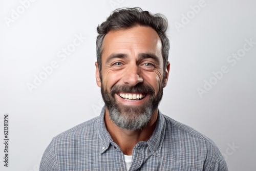 Portrait of a handsome middle-aged man on a white background