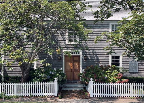 white bench in front of a house