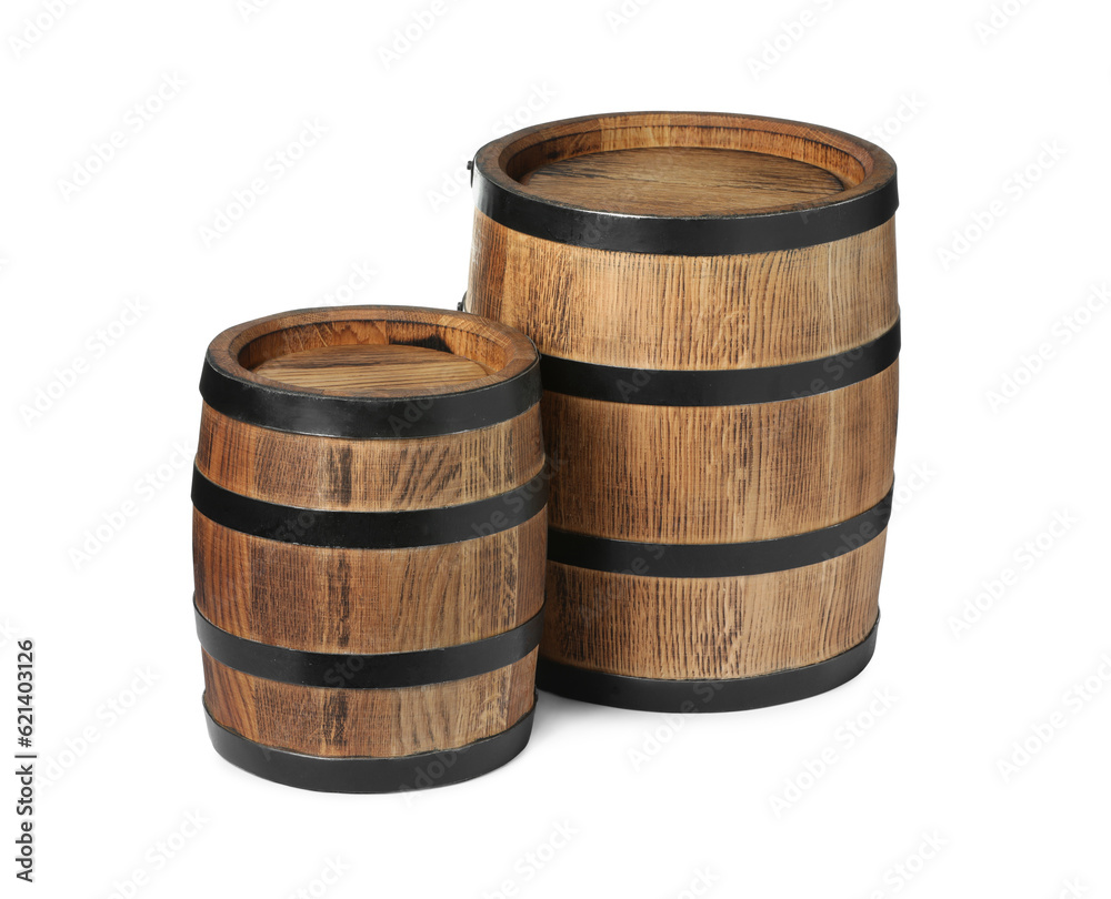 Two traditional wooden barrels isolated on white Two traditional wooden barrels isolated on white