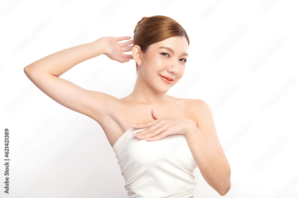 Beautiful Young Asian woman lifting hands up to show off clean and hygienic armpits or underarms on white background, Smooth armpit cleanliness and protection concept Beautiful Young Asian woman lifting hands up to show off clean and hygienic armpits or underarms on white background, Smooth armpit cleanliness and protection concept