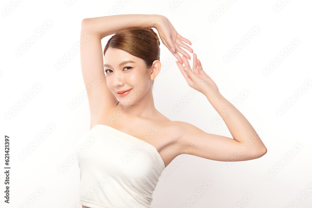 Beautiful Young Asian woman lifting hands up to show off clean and hygienic armpits or underarms on white background, Smooth armpit cleanliness and protection concept Beautiful Young Asian woman lifting hands up to show off clean and hygienic armpits or underarms on white background, Smooth armpit cleanliness and protection concept