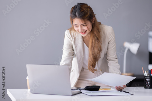 Business Documents, Auditor businesswoman checking searching document legal prepare paperwork or report for analysis TAX time, asian accountant Documents data contract partner deal in workplace office