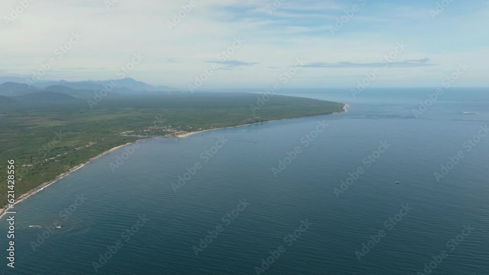 Aerial view of coast of Sumatra with farmland and oil palms. Indonesia. Aerial view of coast of Sumatra with farmland and oil palms. Indonesia.