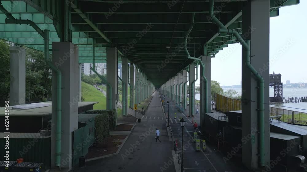 alt flying forwards over bike path under West Side Hwy in NYC alt flying forwards over bike path under West Side Hwy in NYC