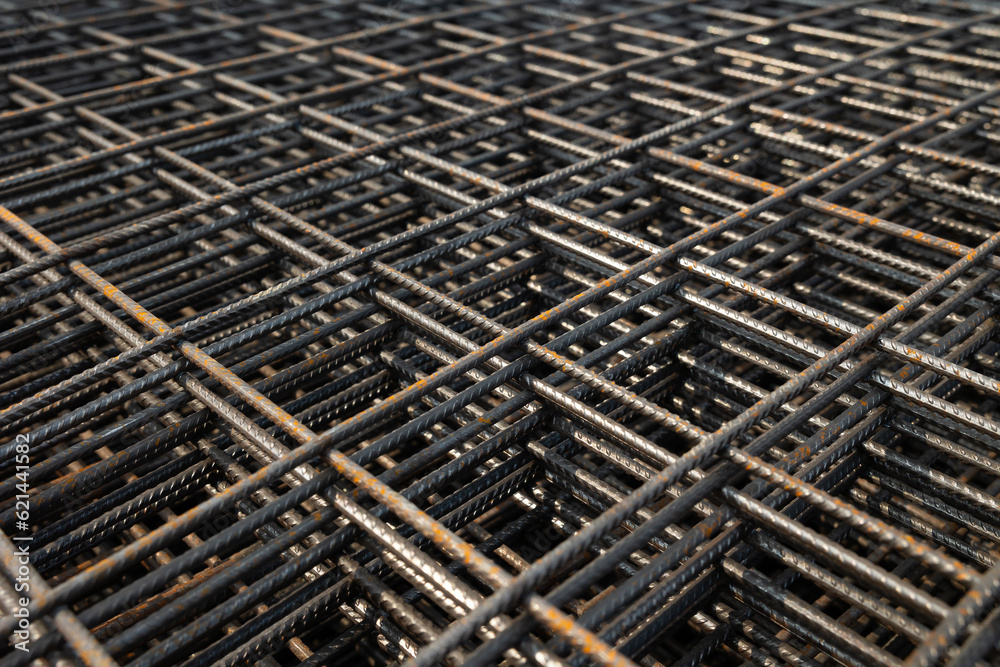Steel Rebars for reinforced concrete. steel wire mesh for concrete slab reinforcement of construction. Background and banner