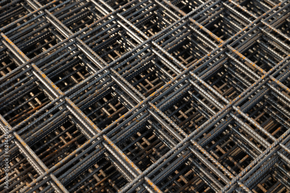 Steel Rebars for reinforced concrete. steel wire mesh for concrete slab reinforcement of construction. Background and banner Steel Rebars for reinforced concrete. steel wire mesh for concrete slab reinforcement of construction. Background and banner
