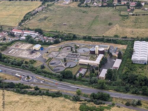 Aerial view of sewage treatment plant, filtration of polluted or waste water.Wastewater treatment plant aerial panorama view,Sewage Treatment facility,Industrial wastewater treatment-Beroun Czech rep. photo