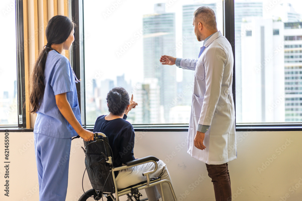 Obraz premium Man doctor with stethoscope service help support discussing and consulting care talk to sick senior asian woman patient in hospital,caregiver,elderly,recovery,illness insurance.healthcare and medicine