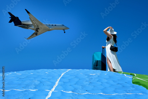 banner advertising travel agency travel huge plane overhead. young woman in white hat long dress suitcase female handbag standing on ocean earth globe mockup bright blue sky space for text