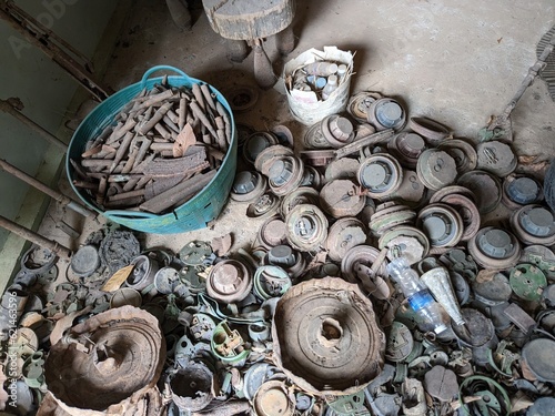 unexploded land mines and cluster bombs remains picked up all around Cambodia after war,now set in Museum of landmines in Siem Reap Cambodia, huge amount of ammunition is still laying in countryside photo