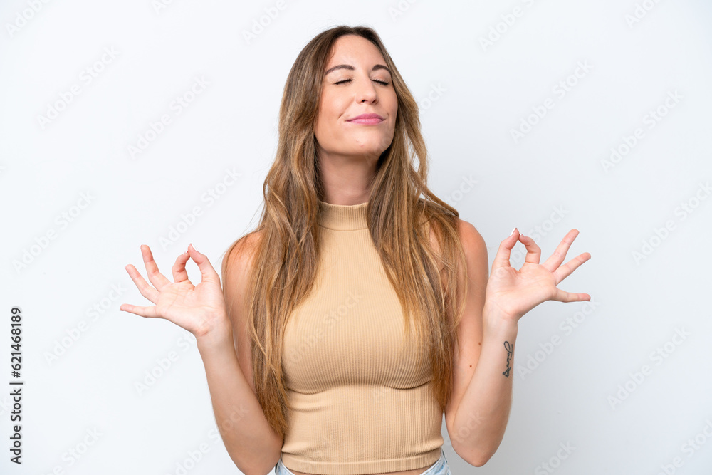 Young caucasian woman isolated on white background in zen pose Young caucasian woman isolated on white background in zen pose