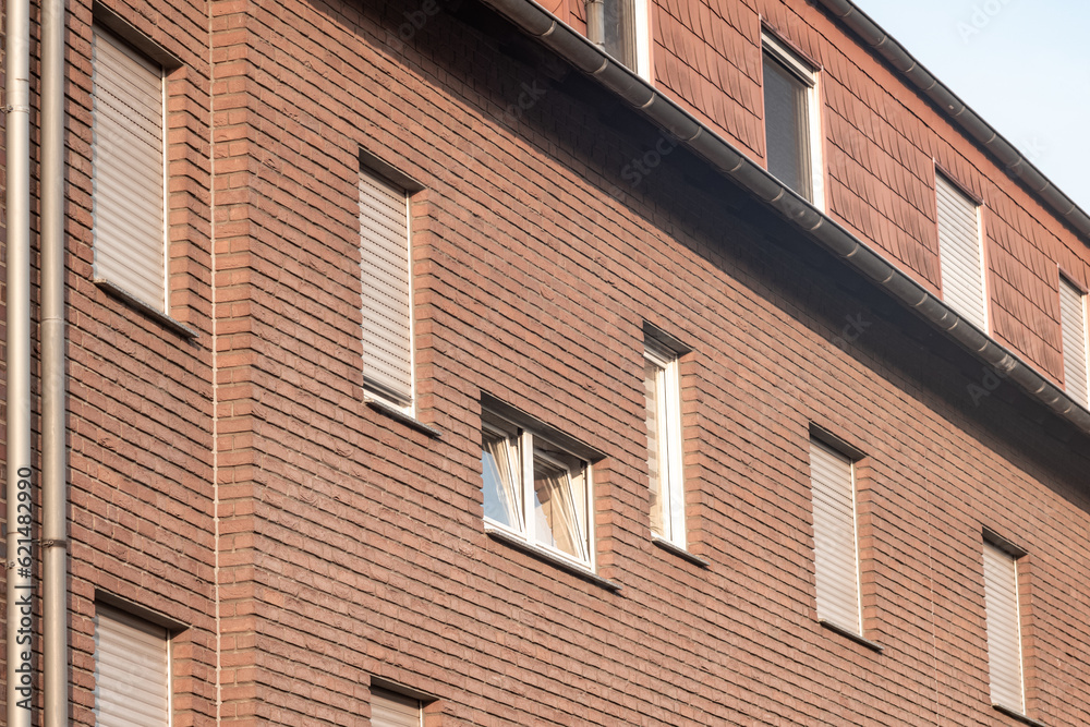 Facade of a new residential building withwindows Facade of a new residential building withwindows
