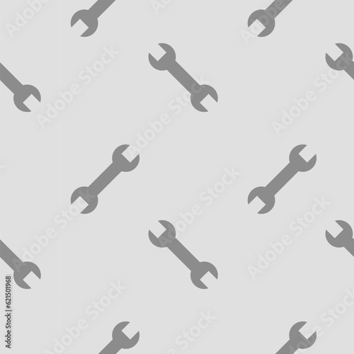 Wrench, seamless pattern, vector. Gray wrench on a gray background.