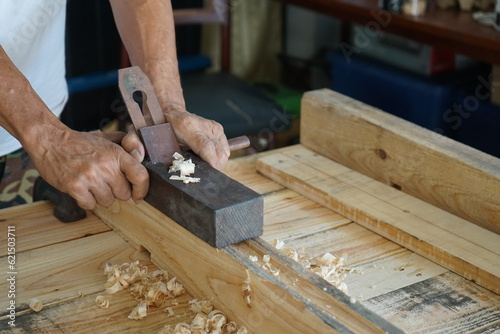 carpenter working on wood