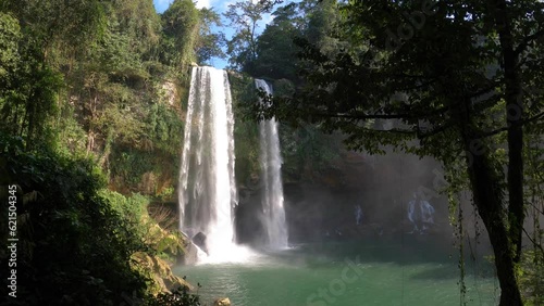 Misol Ha waterfall amidst tropical vegetation in Chiapas state, Mexico photo
