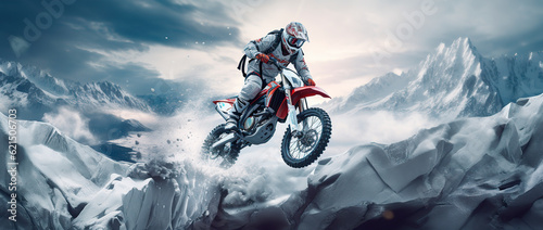 A rider who is on a snowmobile jumping on top of rock.