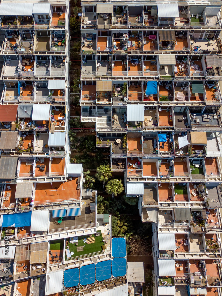 A Terraced apartment building and balconies from a drone view 