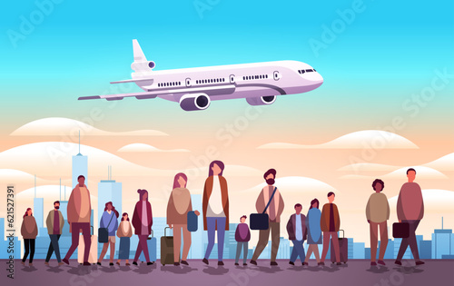 mix race travelers with baggage see airplane flight at airport airplane departure summer vacation concept cityscape background