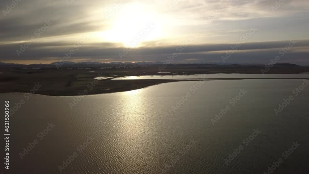 Aerial Shot Of Scenic River Against Sky During Sunset, Drone Flying Backward Over Water - Billings, Montana Aerial Shot Of Scenic River Against Sky During Sunset, Drone Flying Backward Over Water - Billings, Montana