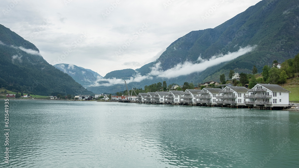 Cloudy day over the small village located at the inner end of the Sognefjord, the longest fjord in the country, surrounded by high mountains and pristine waterfalls in Skjolden, Norway