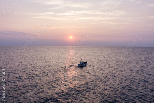 Chalutier au départ de Port Vendres au lever du jour, sunrise upon mediterranean sea in Pyrénées orientales