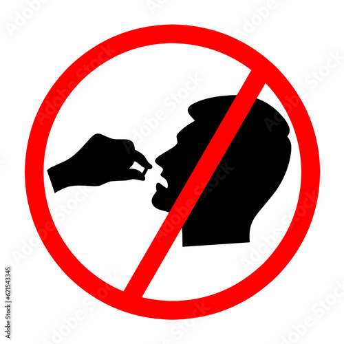 Sign forbidding man taking medicinal pills. Head with open mouth and hand holding pills. Red circle. Isolated on a white background.