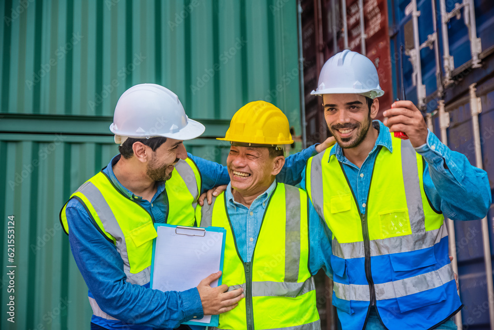 Teamwork Engineer concept, export management team is inspecting the containers. to manage the export of goods to foreign countries. Teamwork Engineer concept, export management team is inspecting the containers. to manage the export of goods to foreign countries.
