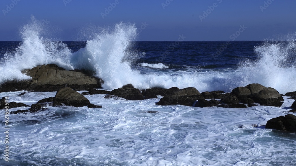 splashing waves on rocks splashing waves on rocks