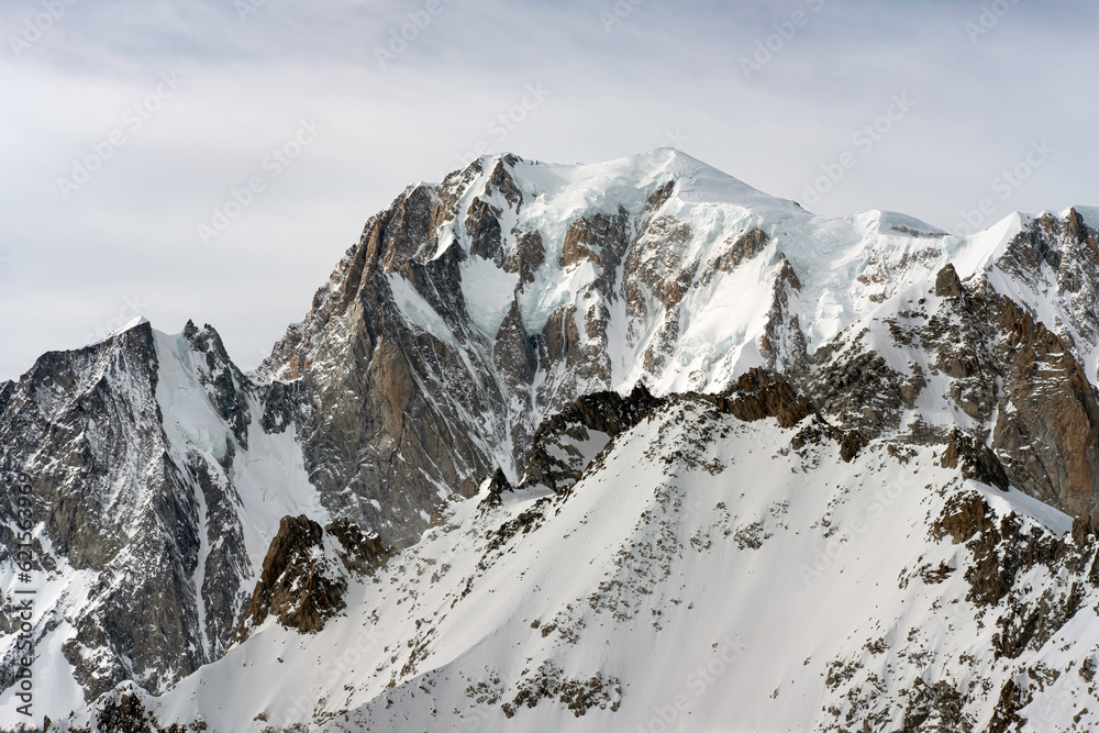 A stunning view of the Mont Blanc range after a light snowfall in winter. Every mountaineer's dream to engage on the severe ice and rock slopes.