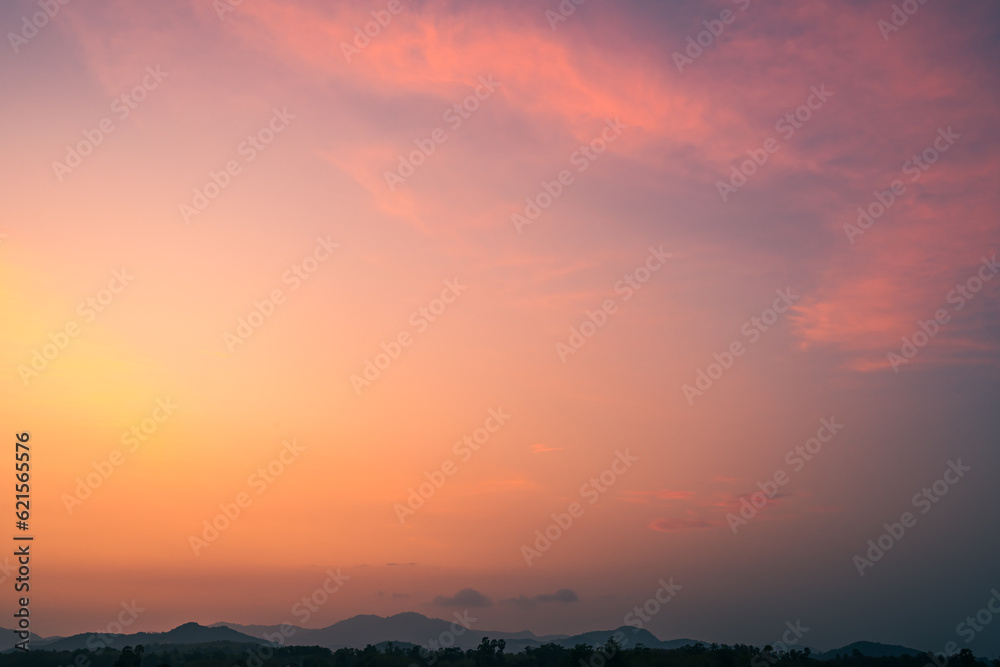 sunset sky clouds over mountain in the evening sunset sky clouds over mountain in the evening