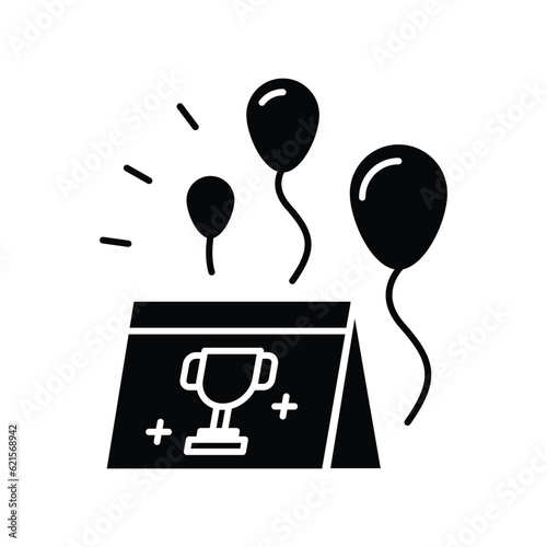 Folded trangle table sign with trophy cup symbol and flying balloons glyph icon vector. Youth and sport day vector illustration for game interface.