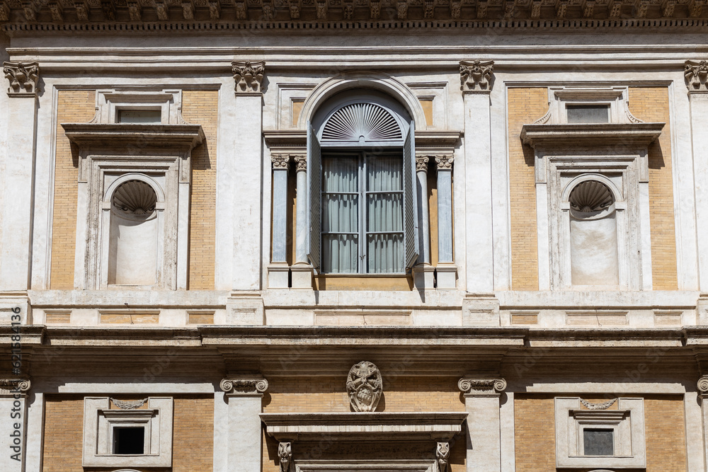 Close view on the facade of a traditional building in Rome, Italy. Architecture of Rome.