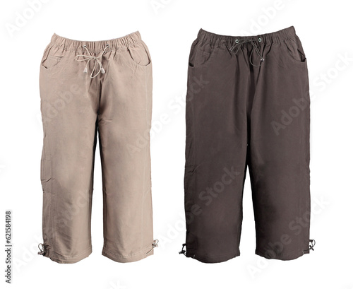 Beige and brown summer capris. Adjustable ties at the sides. Isolated image on a white background. Photo on a mannequin.