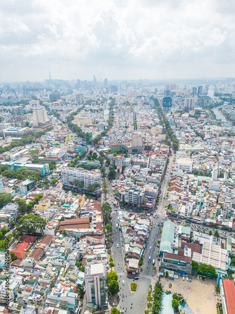 Aerial view of Ho Chi Minh City skyline and skyscrapers in center of heart business at Ho Chi Minh City downtown. Cityscape and many buildings, local houses